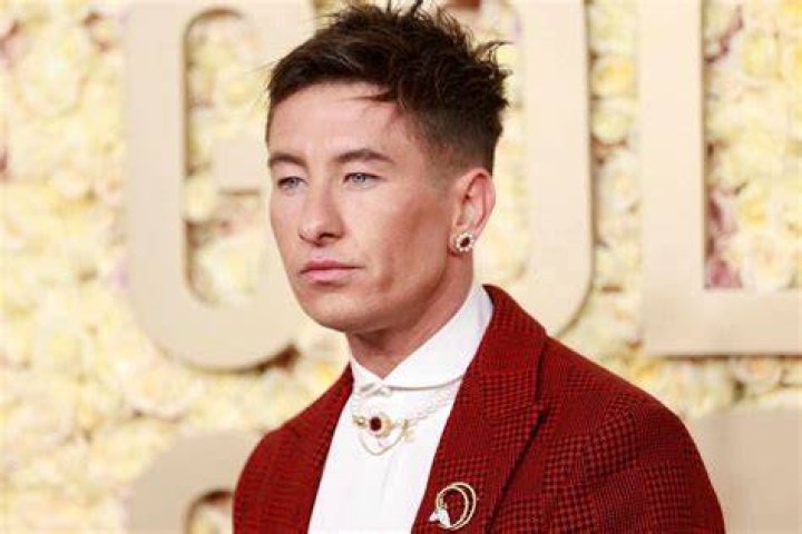 Barry Keoghan Attends 2024 Golden Globes in Dashing Red Suit and Pearl