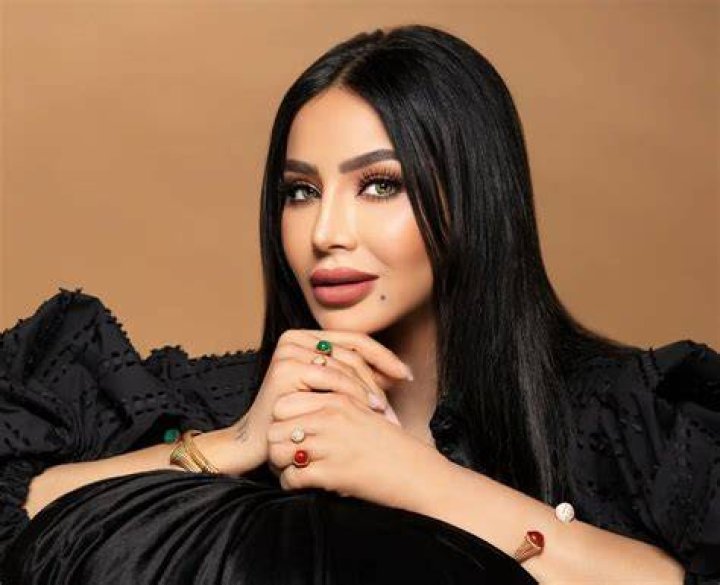 Karen Wazen and Lojain Omran Wore Bright, FeatherTrimmed Dresses to